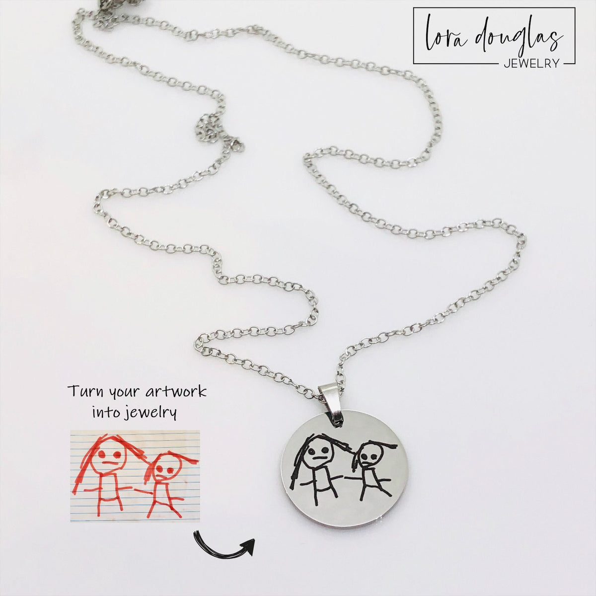 Engraved kids art charm created from an uploaded child's drawing and permanently laser engraved onto a polished stainless steel disc, a personalized artwork keepsake for parents, grandparents, and family members.