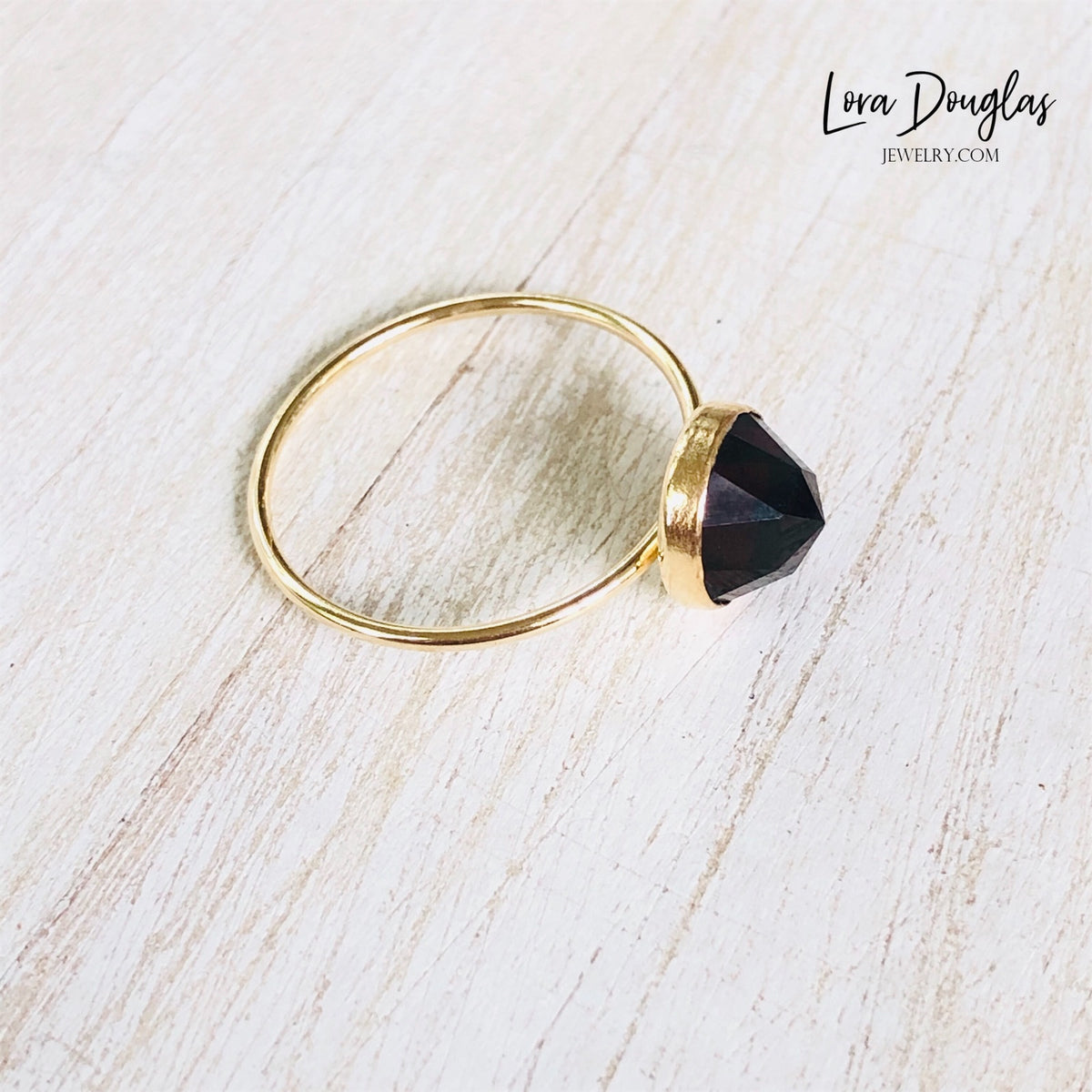 Garnet and gold filled gemstone ring featuring an 8mm rose cut stone in a finished US size 7, a classic choice for shoppers looking for January birthstone jewelry, a birthday gift or second anniversary ring.
