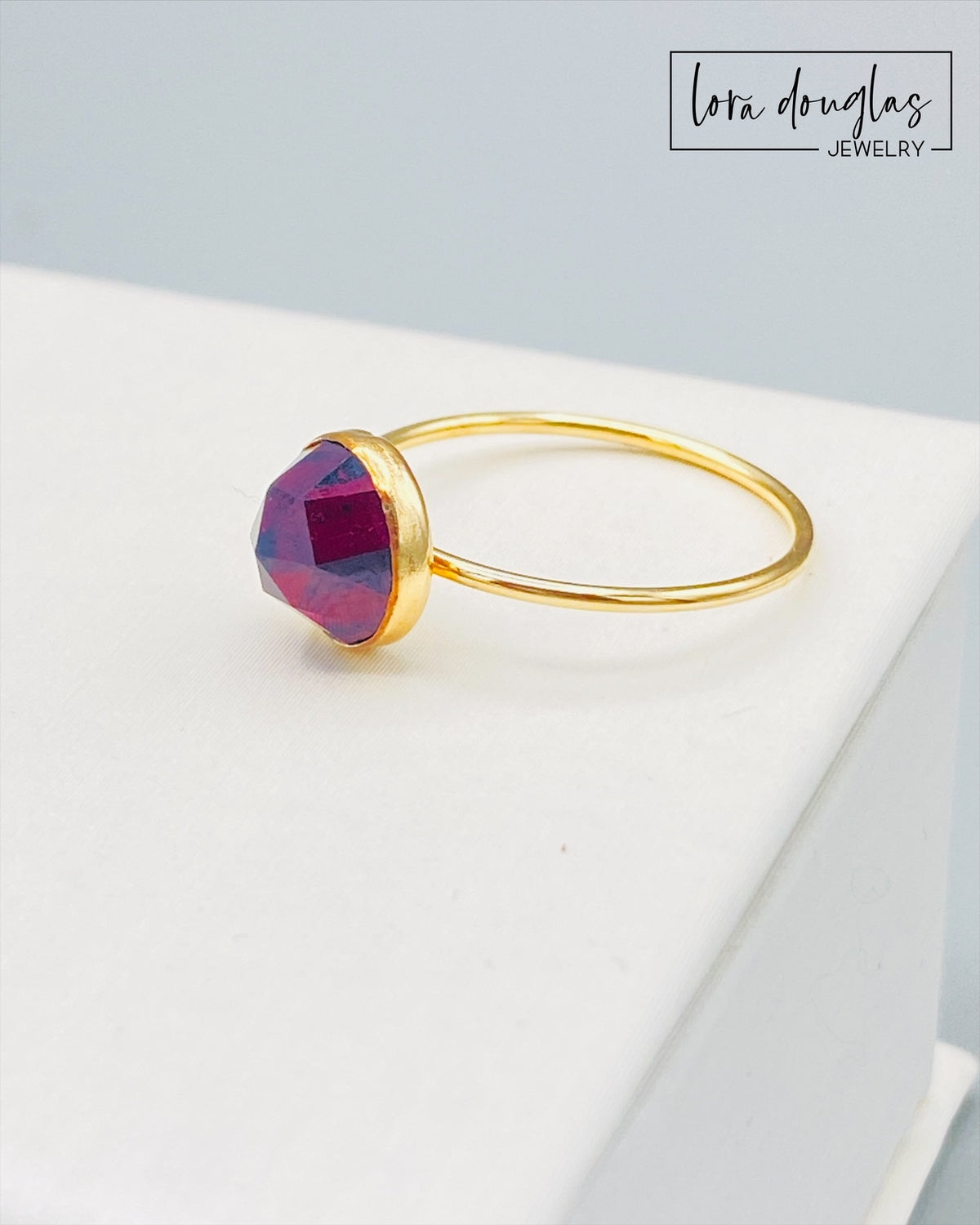 January birthstone ring featuring an 8mm rose cut garnet set in 14/20 gold filled, with a simple gemstone focused design in US size 7 for a birthday, second anniversary or meaningful jewelry gift.
