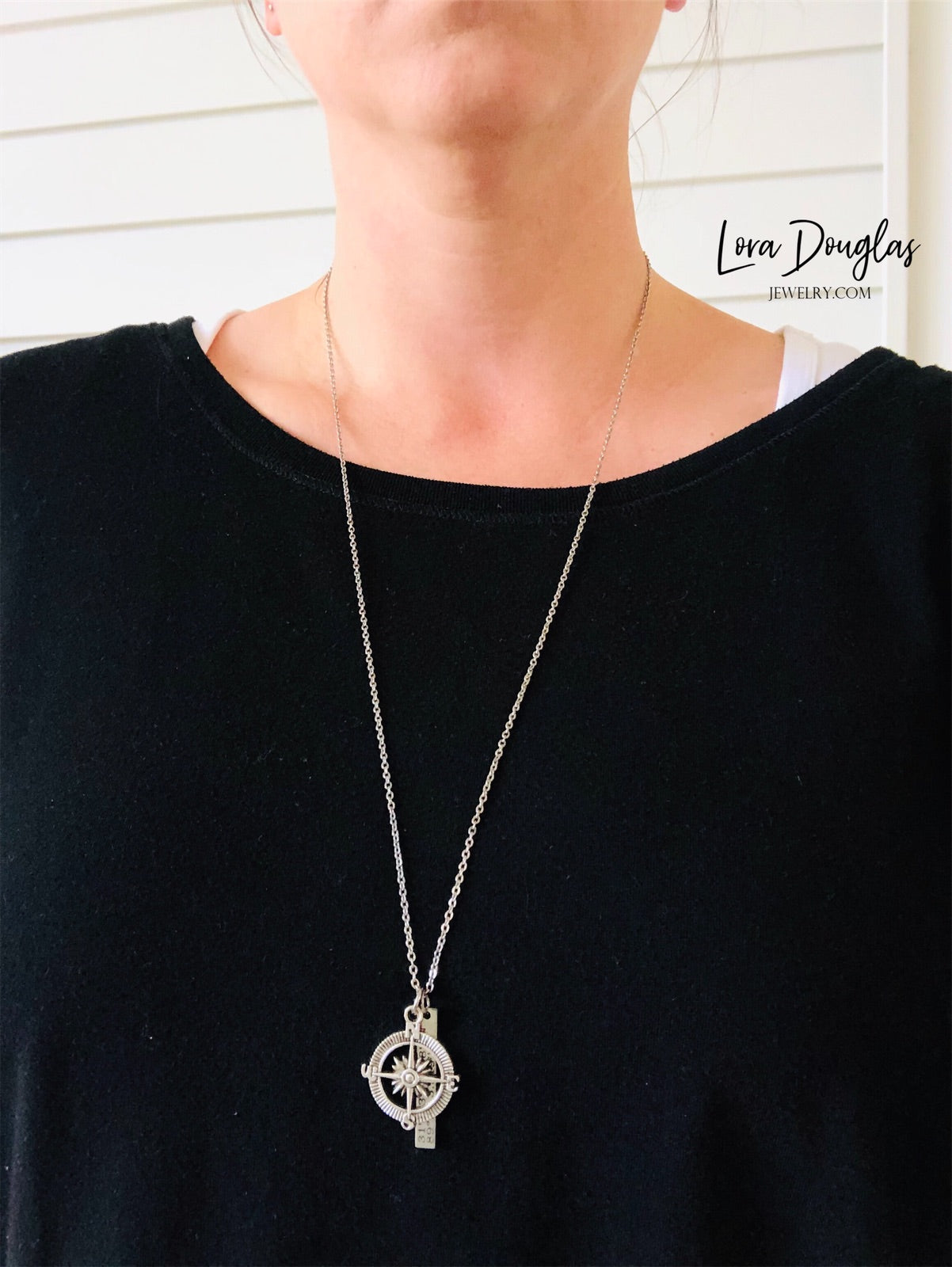 Personalized GPS coordinates necklace crafted from stainless steel with a compass charm and custom engraved coordinate bar. Latitude Longitude Necklace designed to commemorate where life's most meaningful memories happened.