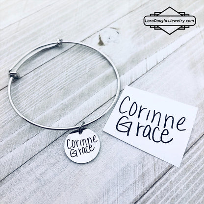 Personalized engraved handwriting charm displayed with optional necklace and bracelet styles. Custom jewelry made from real handwriting, children's artwork, signatures, or meaningful notes for unique keepsake gifts.