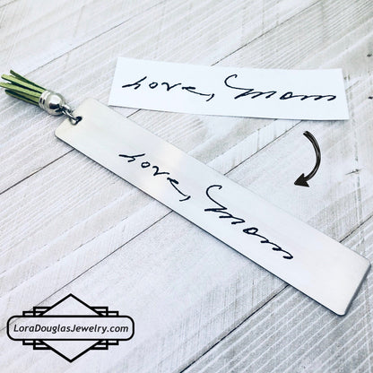 Personalized handwriting bookmark engraved from a real handwritten message on durable stainless steel with a colorful tassel. Thoughtful memorial gift, sympathy gift, wedding vow keepsake, or anniversary gift for book lovers and readers.