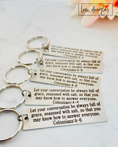 silver metal keychain with custom Bible verse engraved