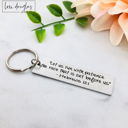 silver metal keychain with custom Bible verse engraved