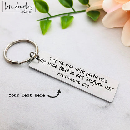 silver metal keychain with custom Bible verse engraved