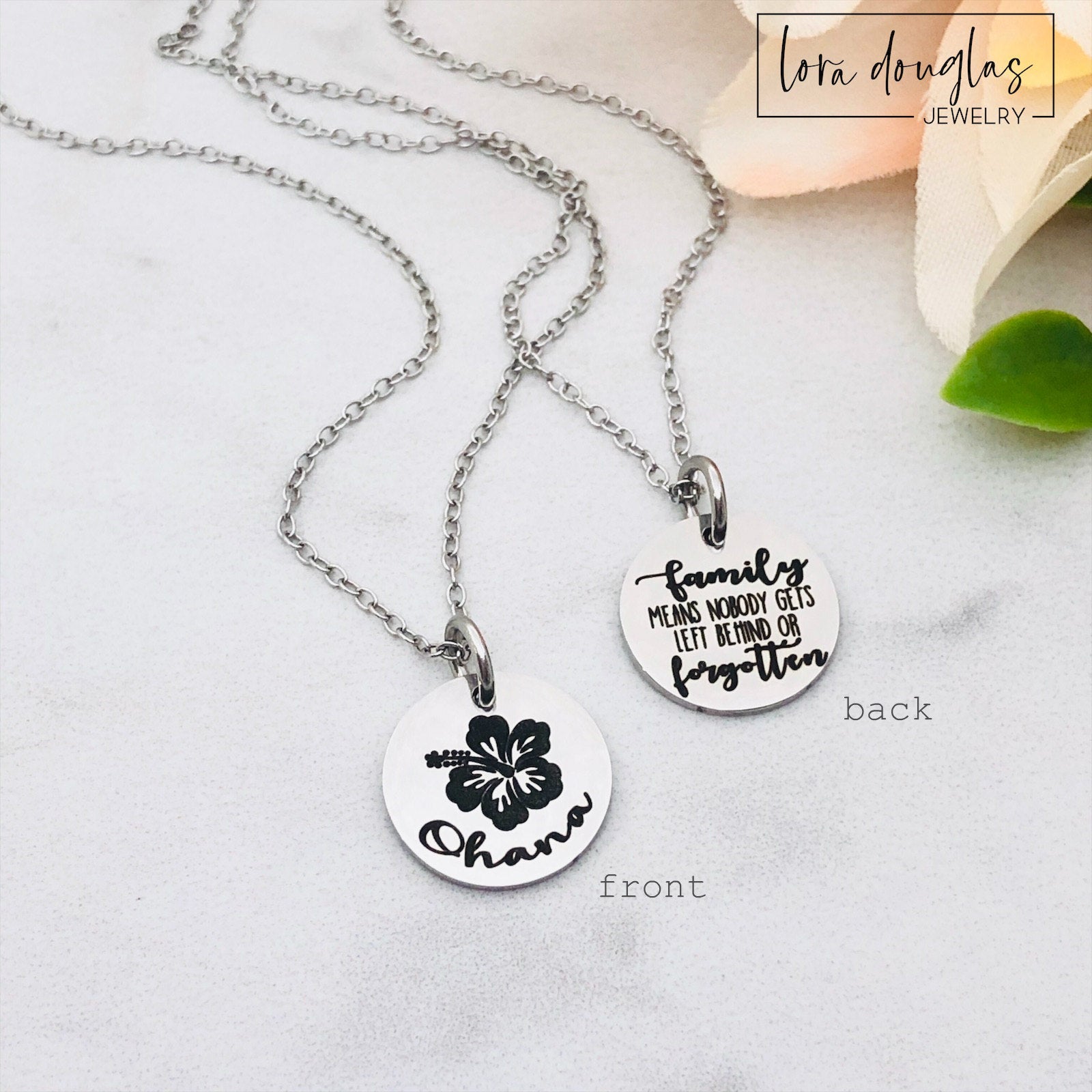 A collection of jewelry items with Ohana, Family means no one gets left behind or forgotten. available in bracelet, necklace or charm options