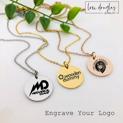 Three custom jewelry charms with engraved logos on a disc-shaped pendant, attached to different types of jewelry including a necklace and a bracelet, with the option to engrave your logo.