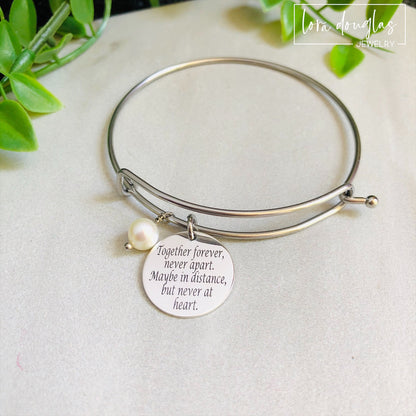 Silver necklace engraved with Together Forever Never Apart Maybe in Distance But Never at Heart