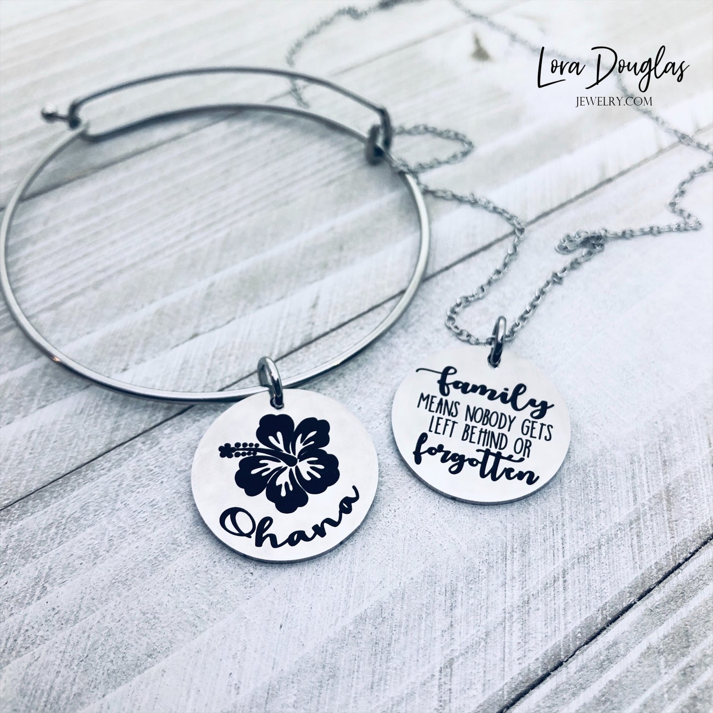 A collection of jewelry items with Ohana, Family means no one gets left behind or forgotten. available in bracelet, necklace or charm options