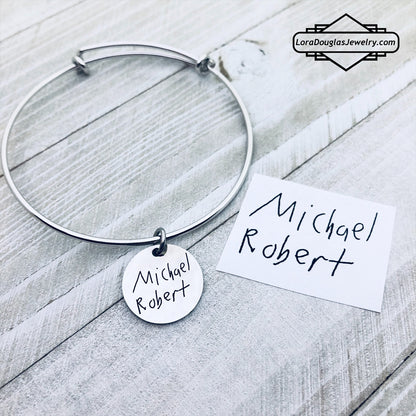 Jewelry engraved with a child’s signature