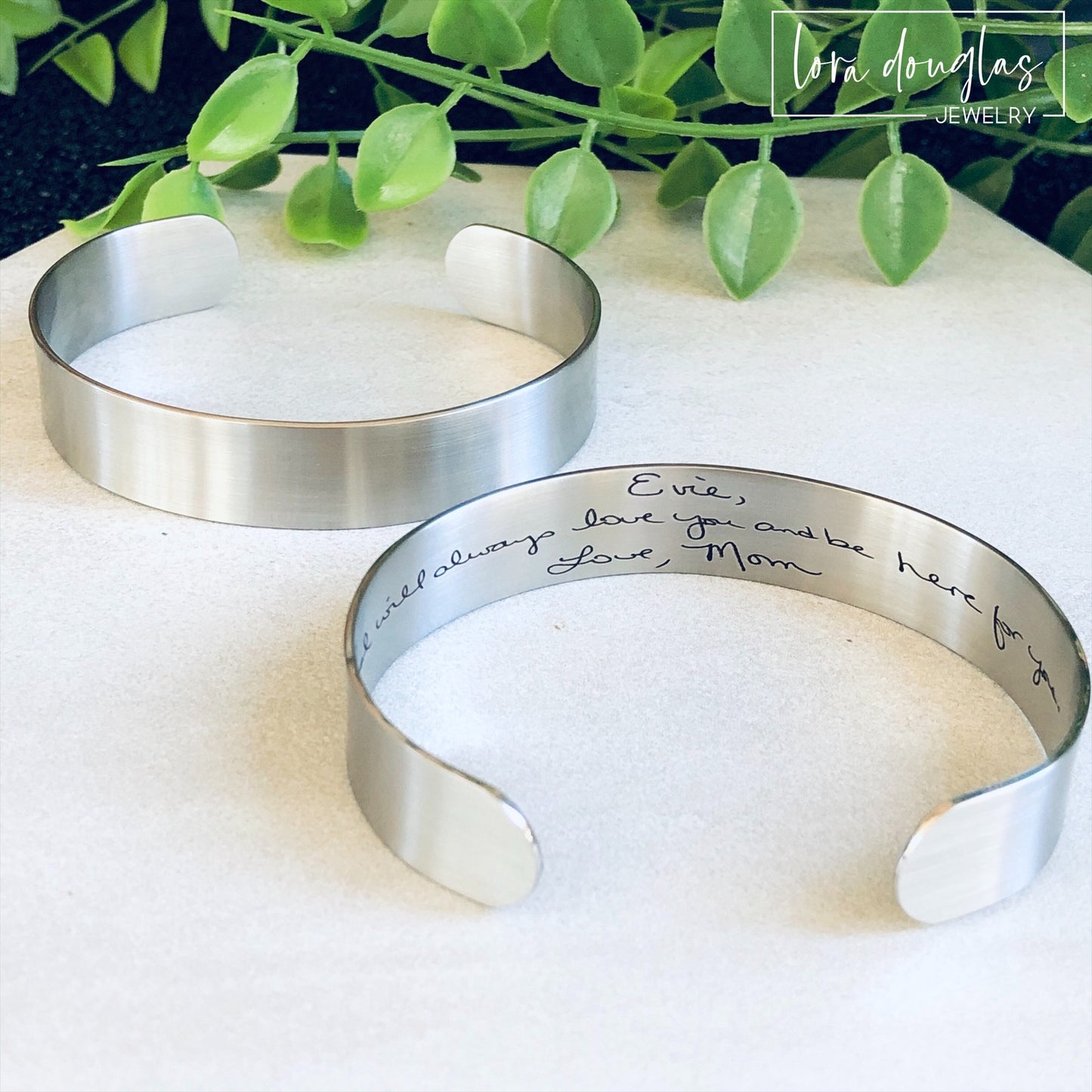 cuff bracelet with handwritten message engraved on the inside