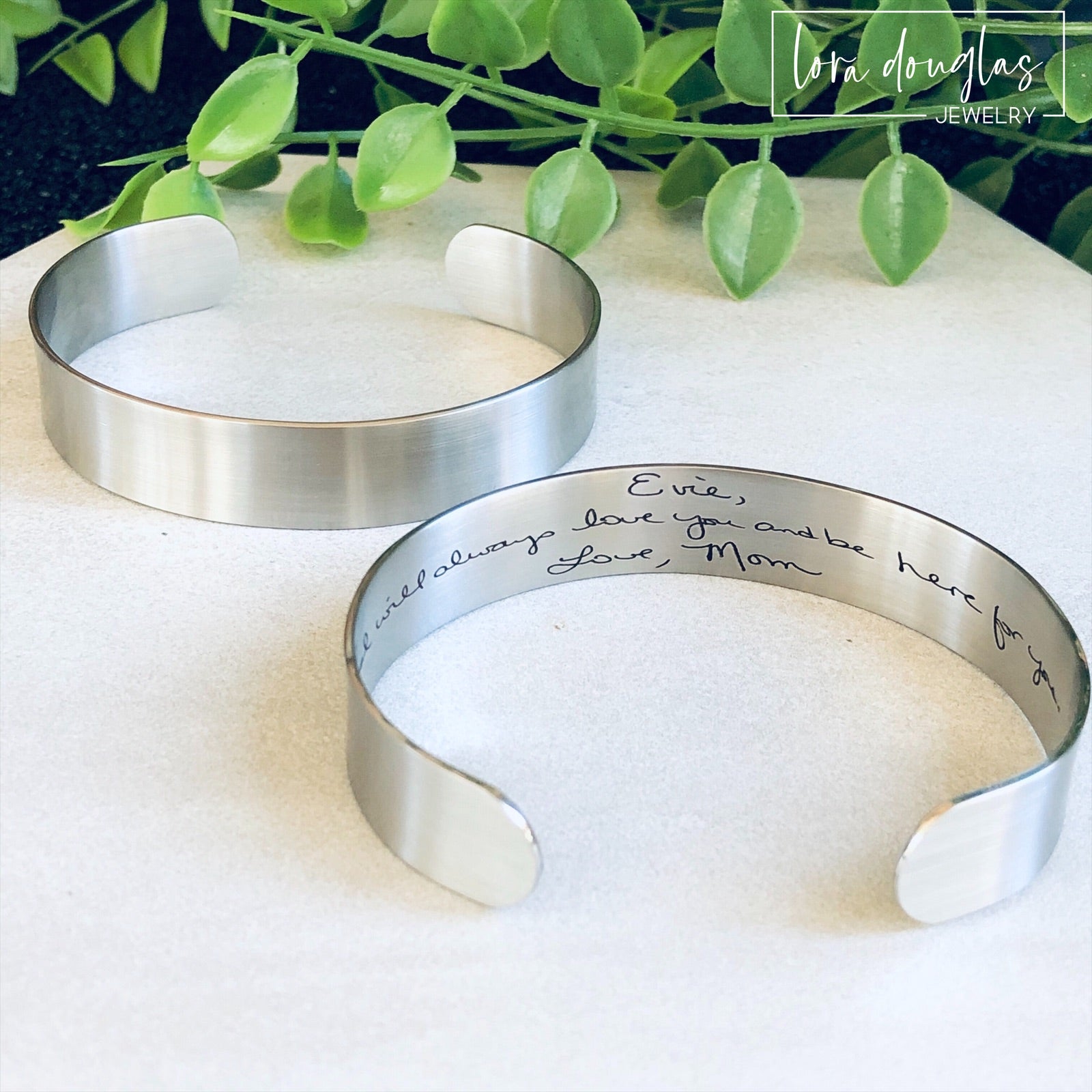 cuff bracelet with handwritten message engraved on the inside