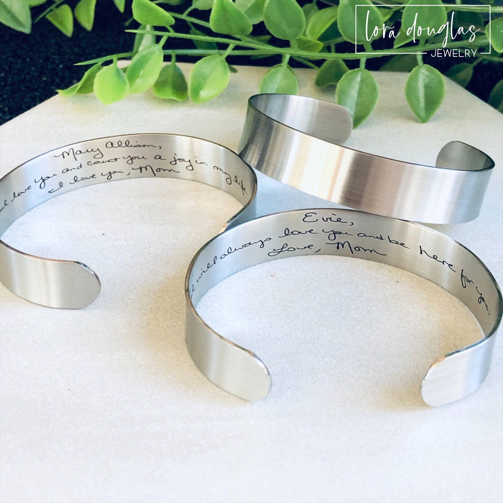 cuff bracelet with handwritten message engraved on the inside