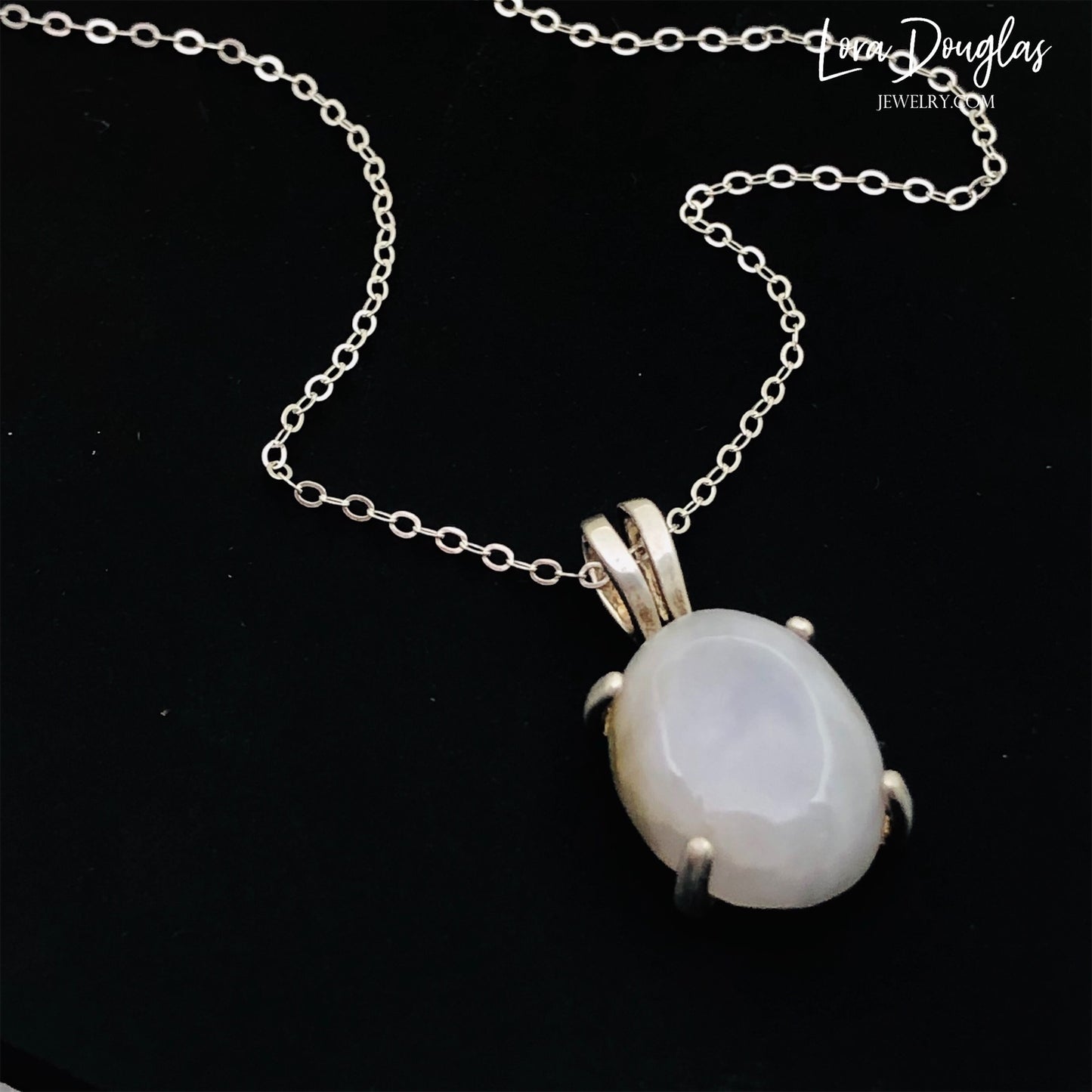 White Quartz Sterling Silver Pendant Necklace features a polished opaque white quartz, also known as quartzite, set in finely crafted sterling silver