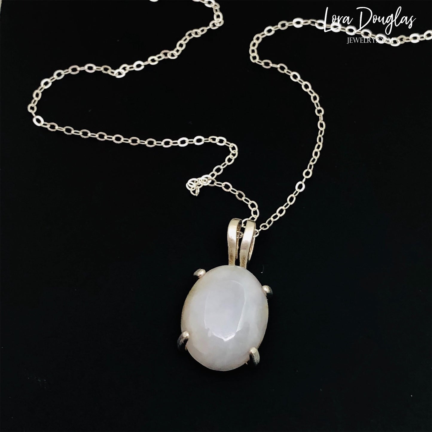 White Quartz Sterling Silver Pendant Necklace features a polished opaque white quartz, also known as quartzite, set in finely crafted sterling silver