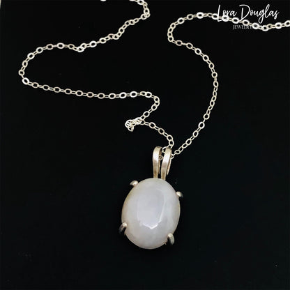 White Quartz Sterling Silver Pendant Necklace features a polished opaque white quartz, also known as quartzite, set in finely crafted sterling silver