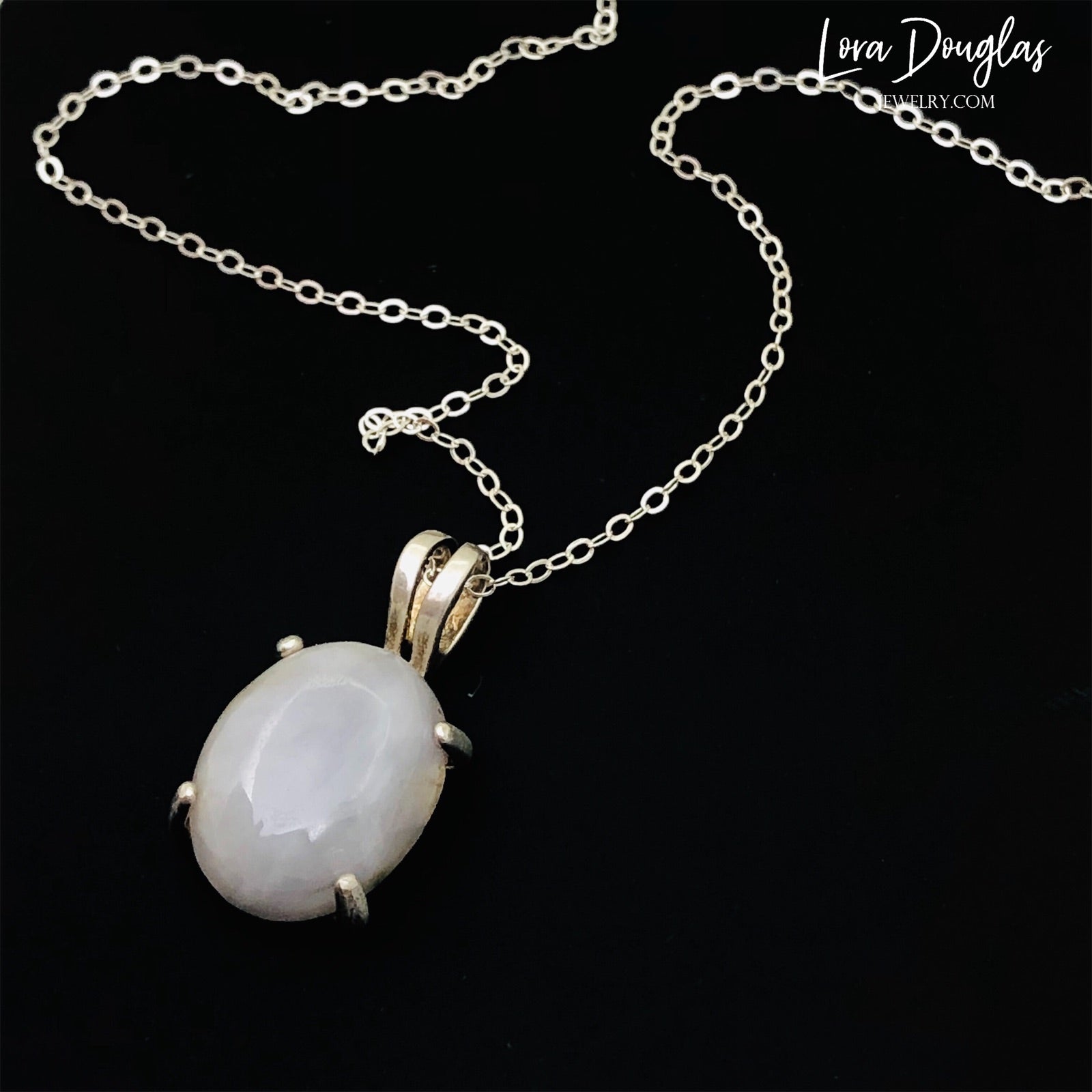 White Quartz Sterling Silver Pendant Necklace features a polished opaque white quartz, also known as quartzite, set in finely crafted sterling silver