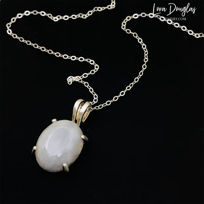 White Quartz Sterling Silver Pendant Necklace features a polished opaque white quartz, also known as quartzite, set in finely crafted sterling silver