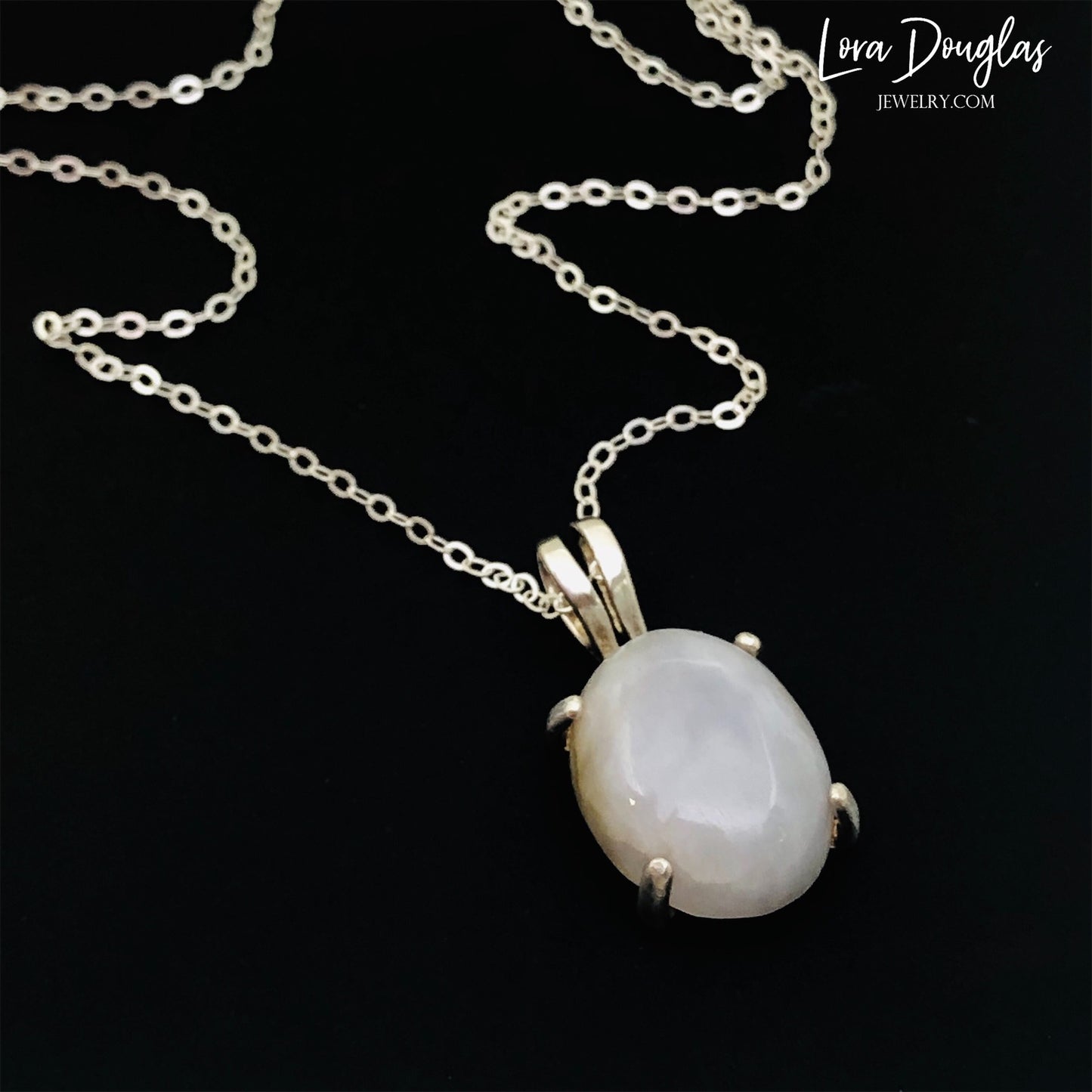 White Quartz Sterling Silver Pendant Necklace features a polished opaque white quartz, also known as quartzite, set in finely crafted sterling silver