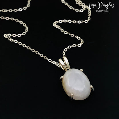 White Quartz Sterling Silver Pendant Necklace features a polished opaque white quartz, also known as quartzite, set in finely crafted sterling silver