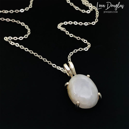 White Quartz Sterling Silver Pendant Necklace features a polished opaque white quartz, also known as quartzite, set in finely crafted sterling silver