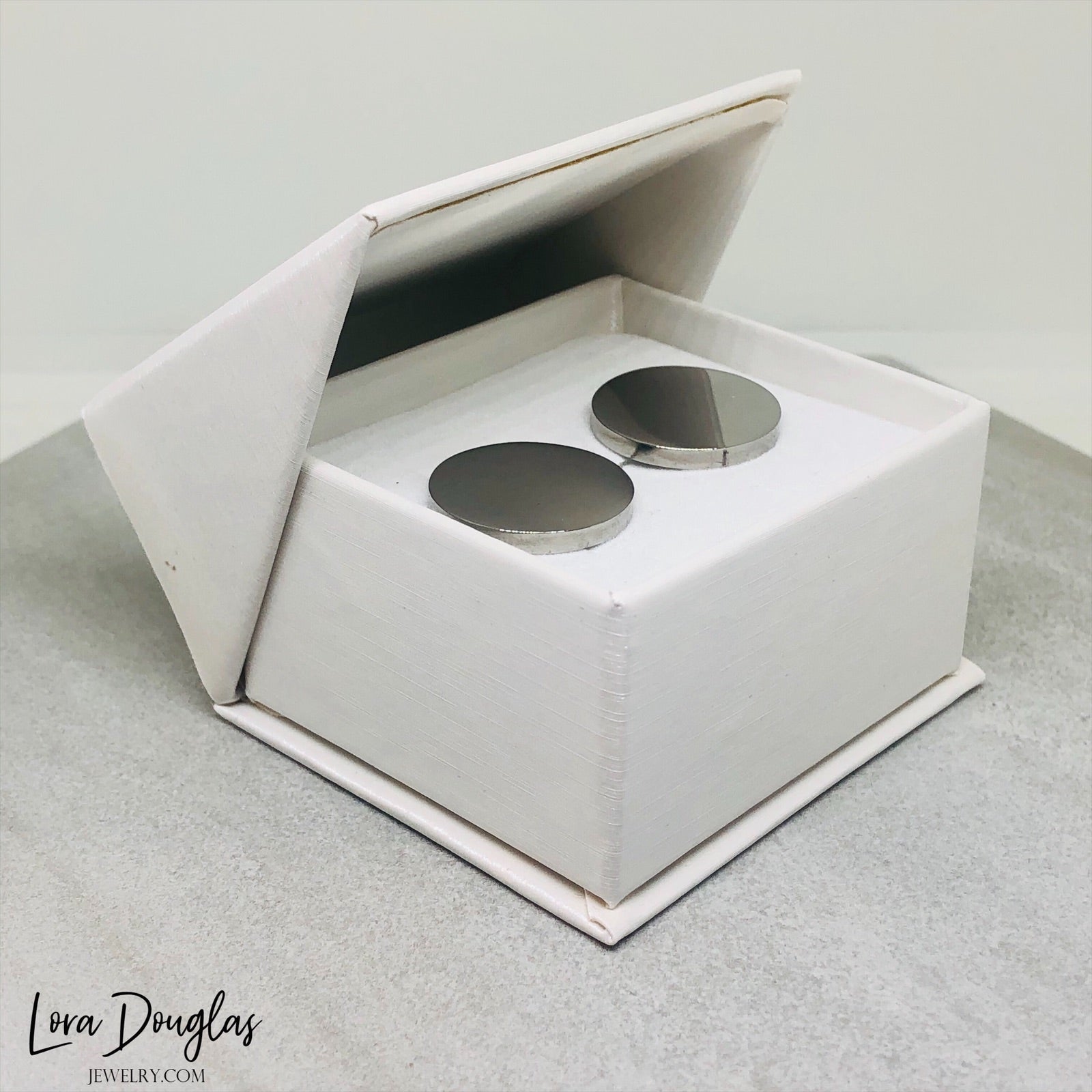 silver stainless steel cufflink that can be engraved with a logo or graphic