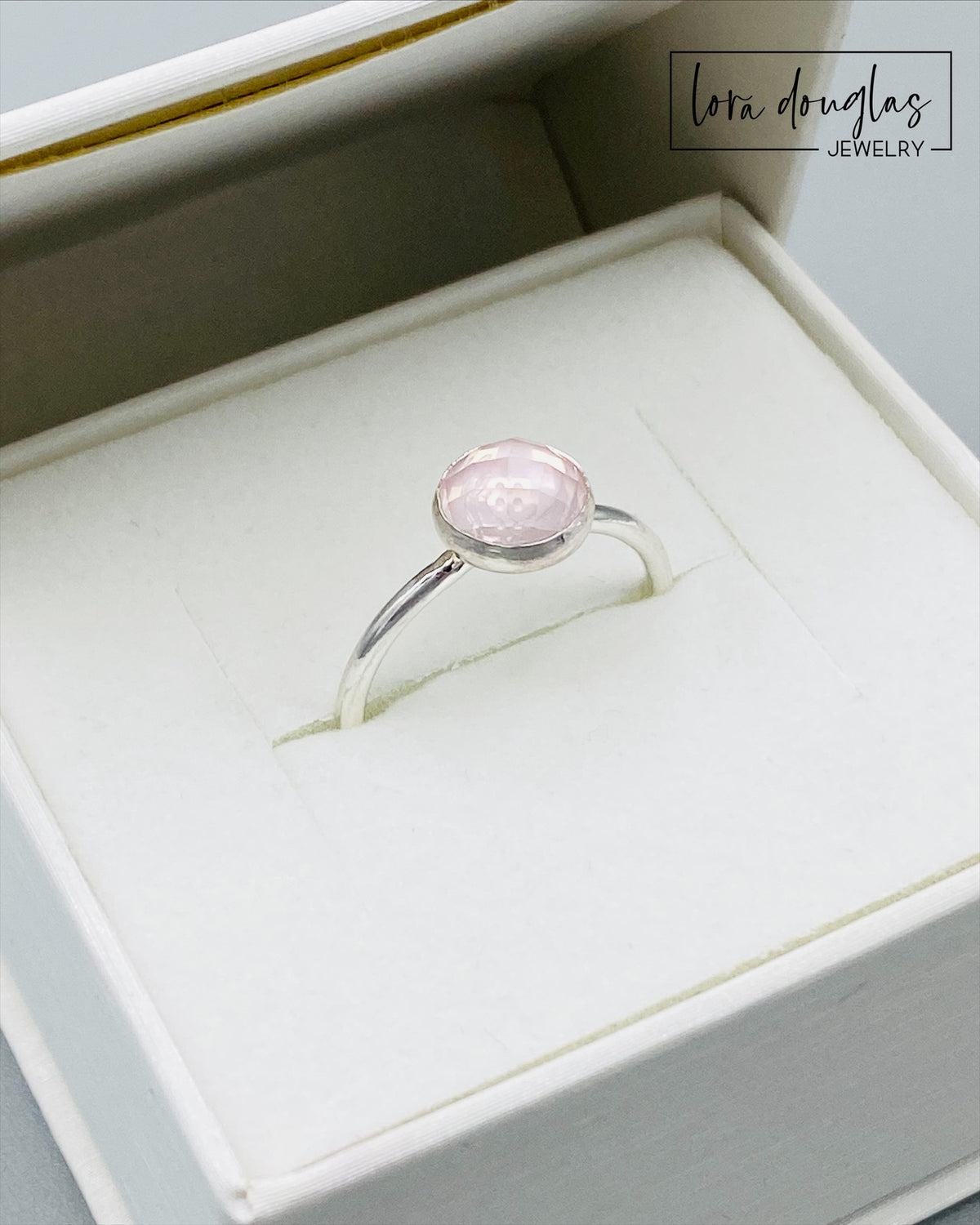 Pink rose quartz gemstone ring featuring an 8mm rose cut natural stone set in sterling silver, a finished size 7.5 solitaire ring for anyone looking for romantic jewelry, an anniversary gift or a natural stone ring.
