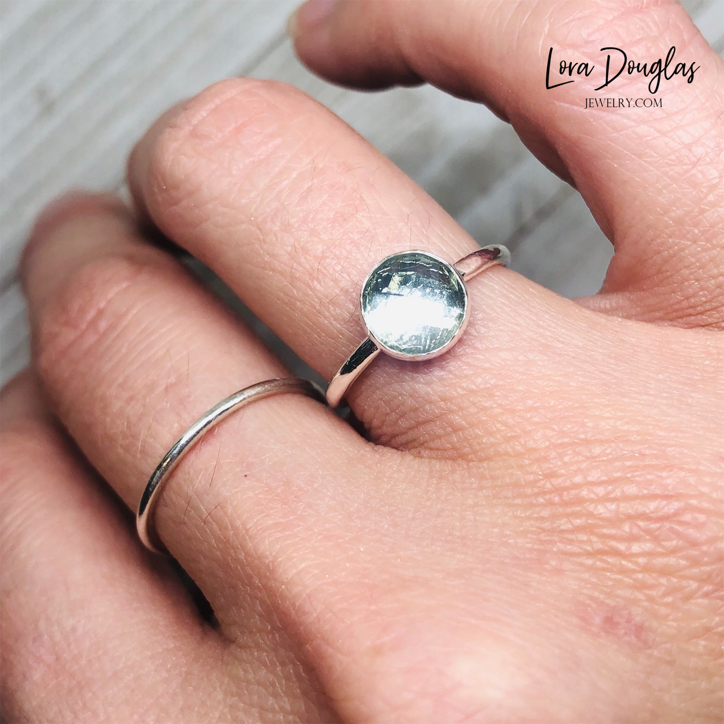 Prasiolite solitaire ring featuring an 8mm faceted green quartz gemstone in sterling silver, shown in finished US size 6 for shoppers looking for green amethyst jewelry, a birthday gift or meaningful gift for her.
