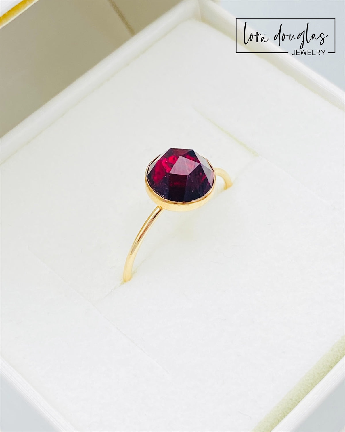 Rose cut garnet ring featuring an 8mm faceted gemstone set in warm 14/20 gold filled, shown as a finished US size 7 ring for shoppers looking for January birthstone jewelry or a classic garnet gift.
