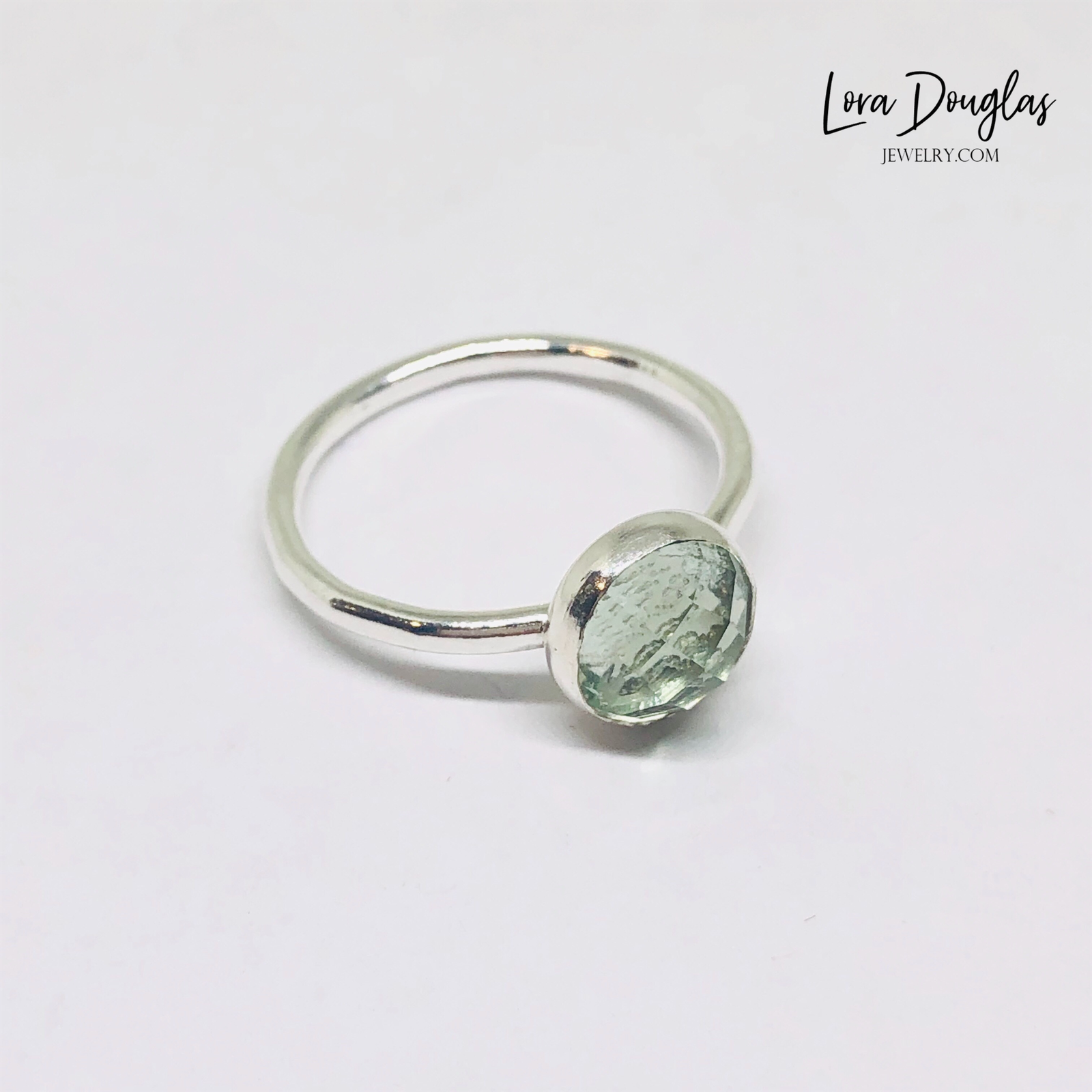 Rose cut green amethyst ring featuring a faceted 8mm prasiolite gemstone set in genuine sterling silver, with a classic solitaire design and finished size 6 band for natural gemstone jewelry lovers.
