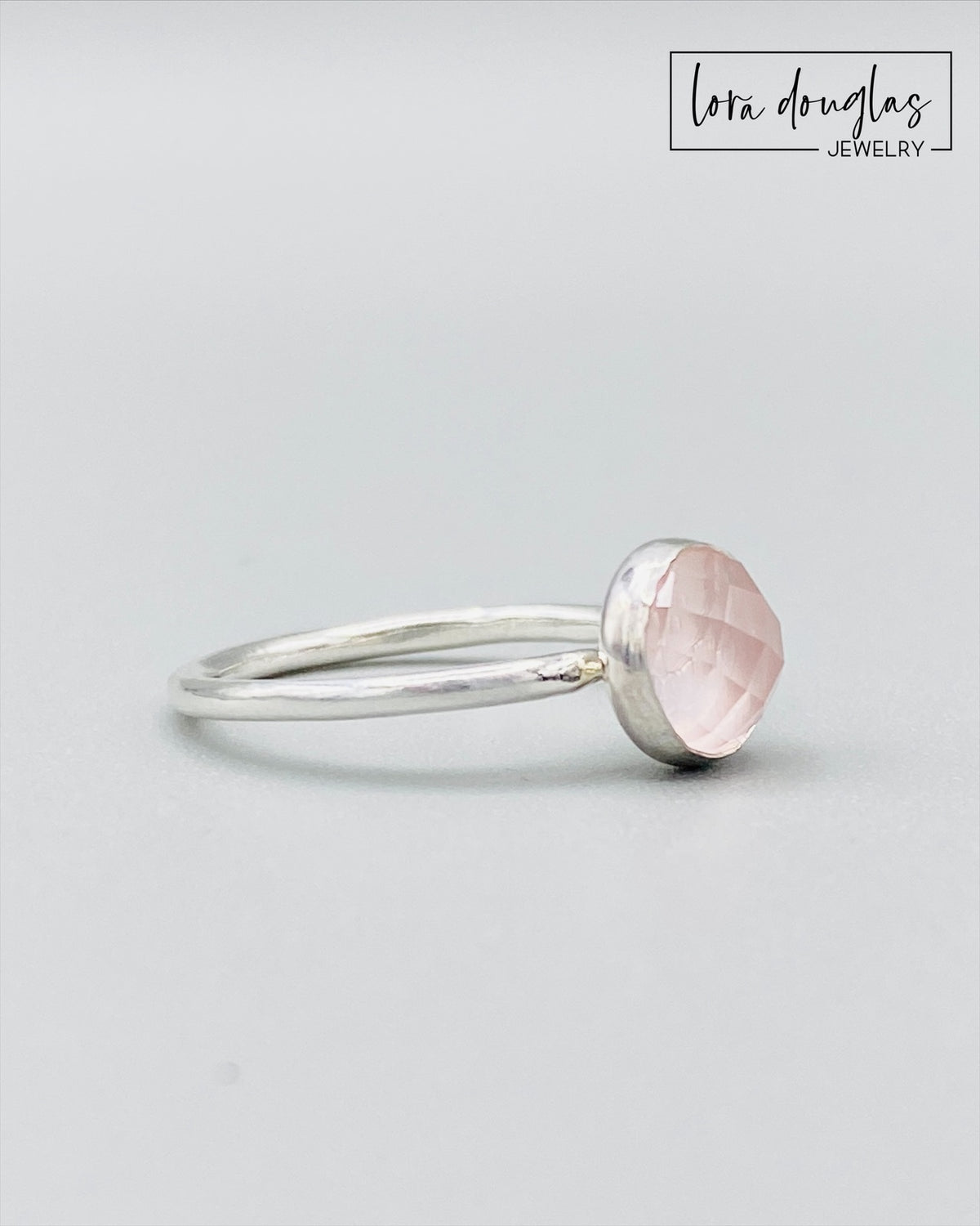 Rose cut rose quartz ring featuring a natural 8mm pink gemstone in a classic sterling silver solitaire setting, a finished size 7.5 ring for lovers of minimalist gemstone jewelry and soft pink stones.
