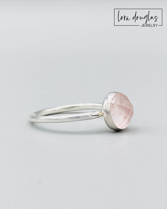 Rose cut rose quartz ring featuring a natural 8mm pink gemstone in a classic sterling silver solitaire setting, a finished size 7.5 ring for lovers of minimalist gemstone jewelry and soft pink stones.
