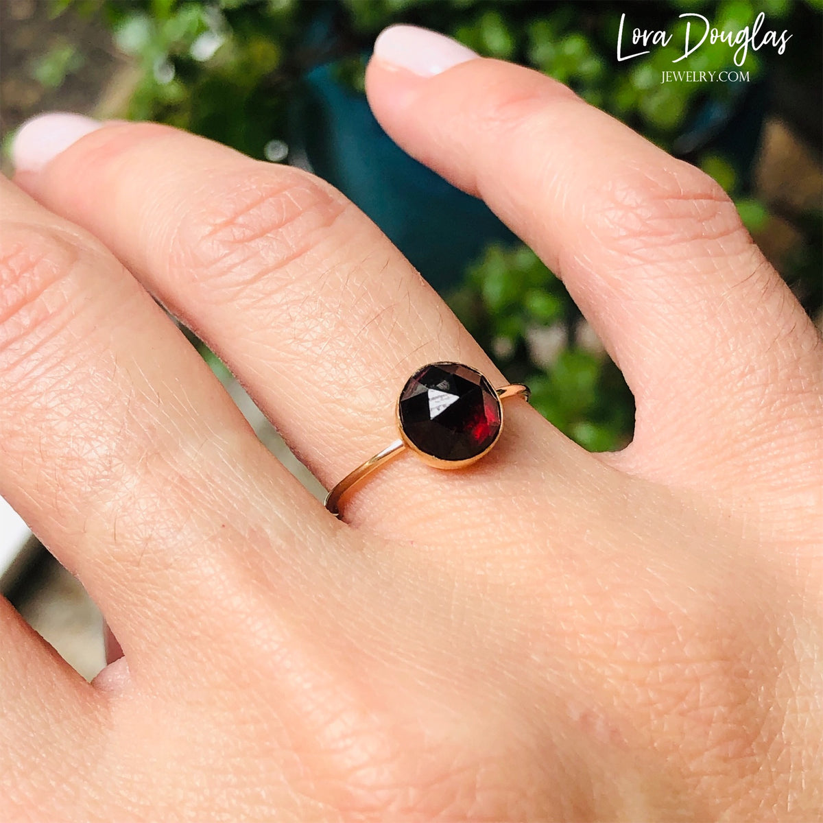 Size 7 garnet ring with an 8mm rose cut faceted gemstone and 14/20 gold filled setting, highlighting the rich garnet color and warm gold finish of this classic January birthstone jewelry design.
