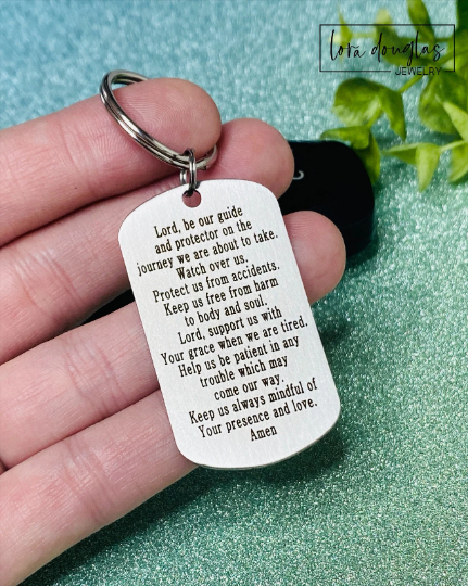 Stainless steel dog tag keychain customized with engraved text and optional two sided engraving. Personalized engraved keychain gift featuring a brushed silver finish and standard key ring for daily use.