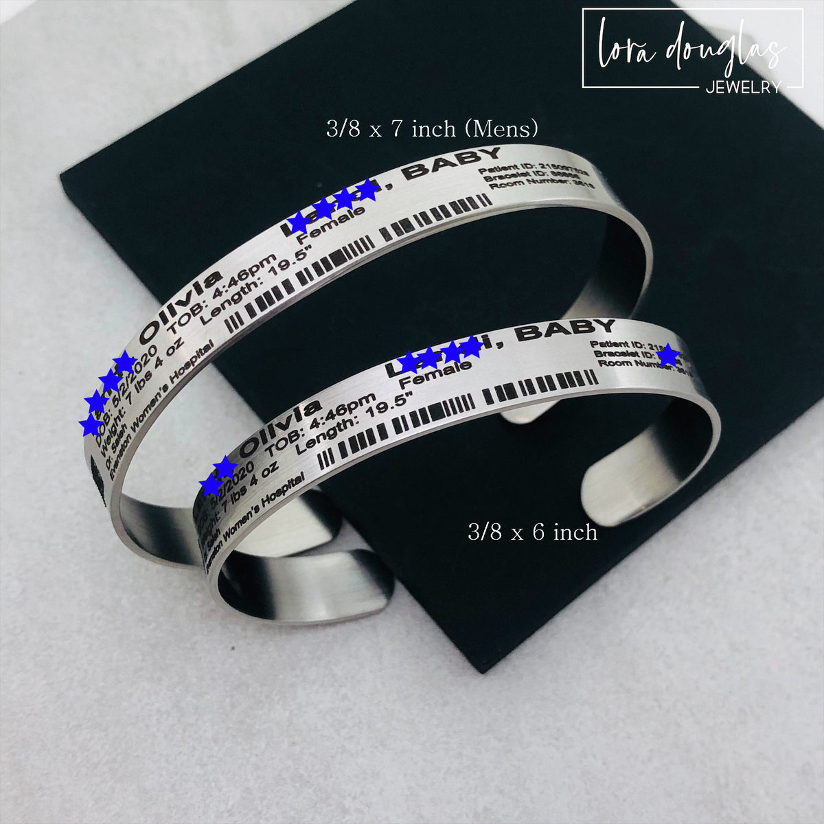 Stainless steel hospital ID cuff personalized with a baby's newborn information and designed as a commemorative birth bracelet, available in silver, gold and rose gold finishes with multiple cuff size options.
