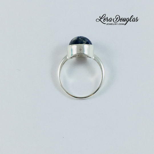 Sterling silver gemstone ring featuring a natural 10mm sodalite stone with rich blue coloring, shown in US size 6 for shoppers seeking sodalite jewelry, blue gemstone rings or a meaningful gift for her.
