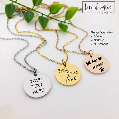 Three engraved pendant necklaces with chain add-ons, featuring custom text on each pendant. One in silver, one in gold, and one in rose gold, displayed on a white surface with a green plant in the background.