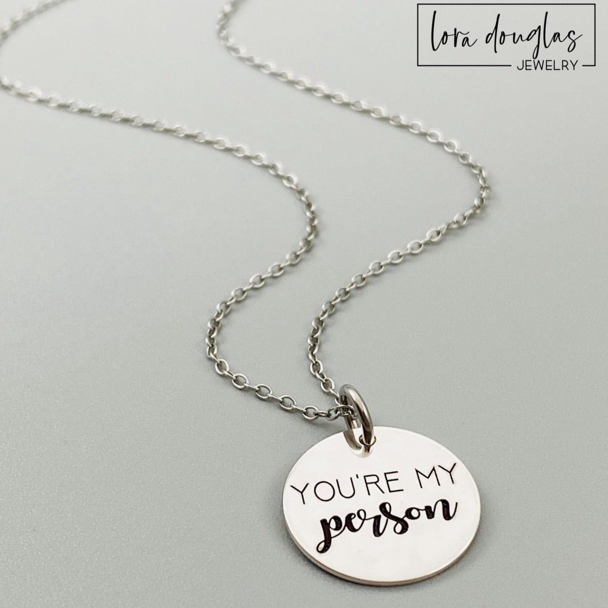  "You're My Person" disc charm, available as a necklace or bracelet. 