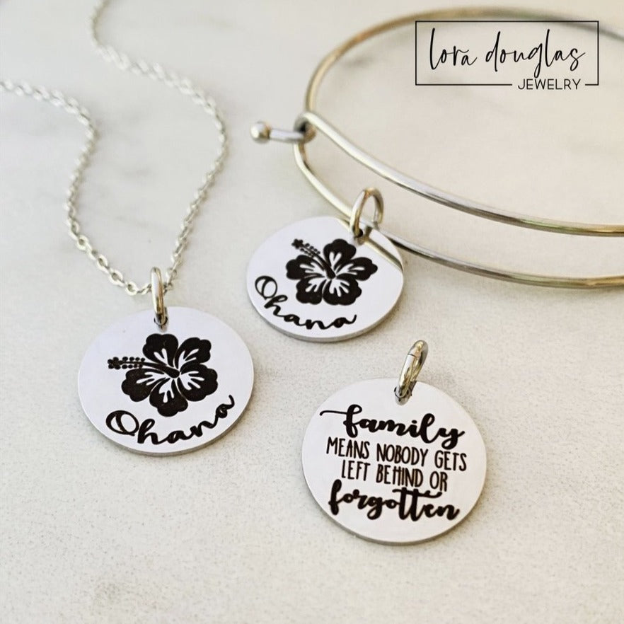 A collection of jewelry items with Ohana, Family means no one gets left behind or forgotten. available in bracelet, necklace or charm options