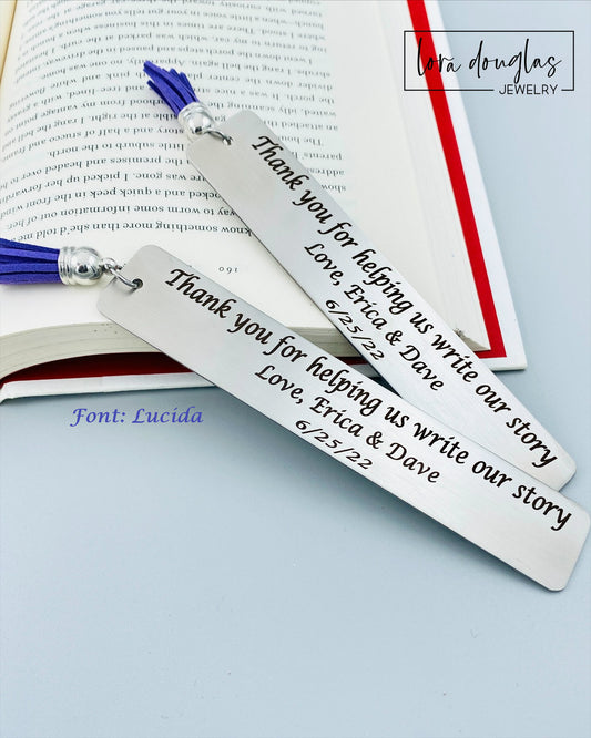 Two stainless steel bookmarks with personalized engraving, 'Thank you for helping us write our story. Love, {Name 1} & {Name 2}' and a date