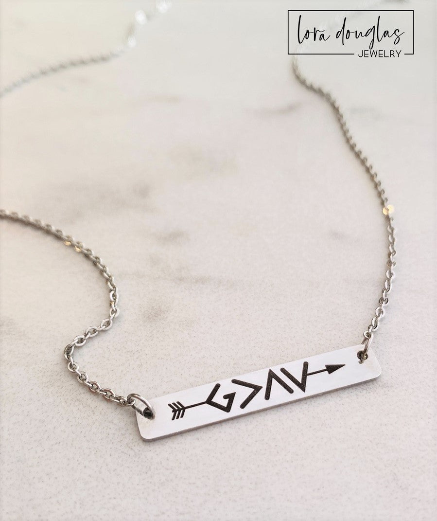 God Is Greater Than The Highs and Lows  bar necklace. Featuring a clever symbol design. Gold or silver bar necklace