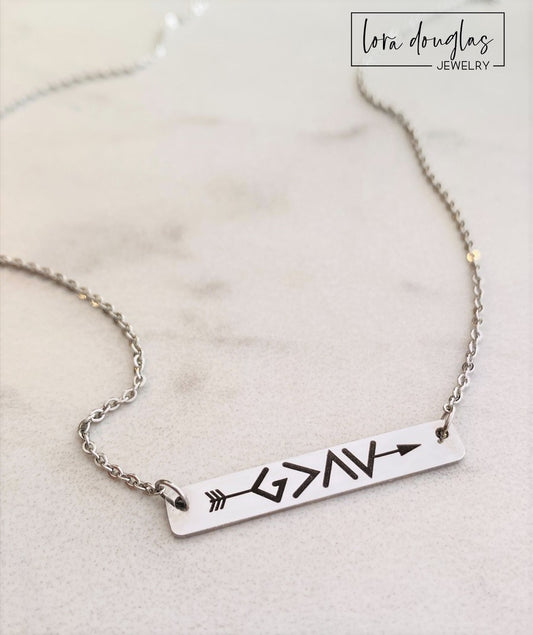 God Is Greater Than The Highs and Lows  bar necklace. Featuring a clever symbol design. Gold or silver bar necklace