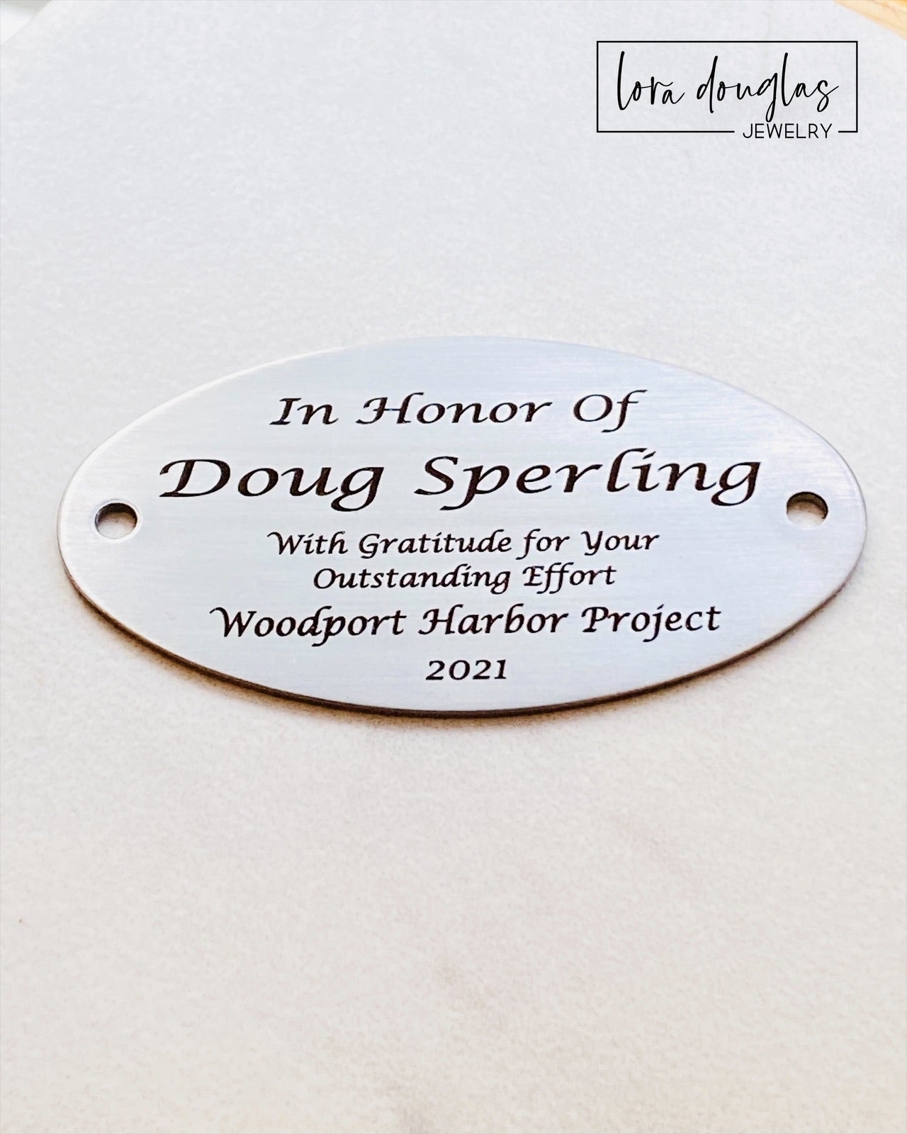 This engraved memorial plaque offers a timeless way to honor loved ones or commemorate special moments. Crafted for clarity and durability, it serves as a meaningful dedication on benches or other surfaces. Please note that hardware for mounting is not included, allowing you to select the best option for your installation needs. Ideal for personalized tributes, this plaque combines craftsmanship with lasting remembrance.