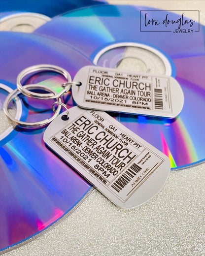 Capture your favorite concert memories with this playful dog tag style keychain, custom engraved to mimic your ticket stub from any band, concert, or event.