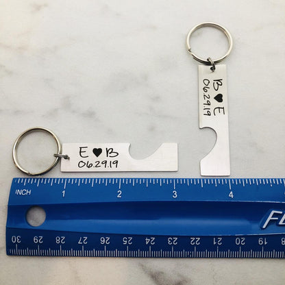 Two stainless steel keychains with laser engraved personalization