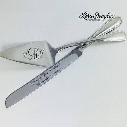 A stainless steel cake knife and server personalized with laser engraved initials and names for wedding cake cutting ceremony 