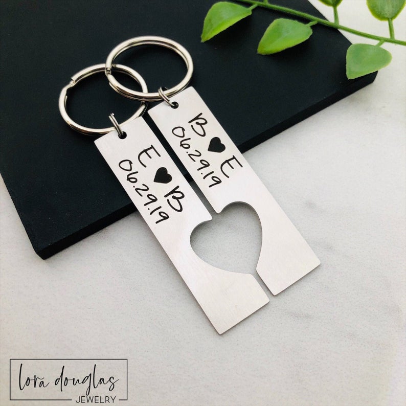 Two stainless steel keychains with laser engraved personalization